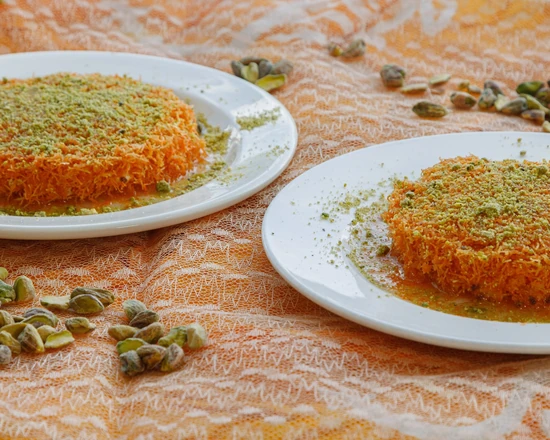 Knafeh Nabulsi kunafa dessert topped with pistachios from Yafa Café in Winnipeg, MB